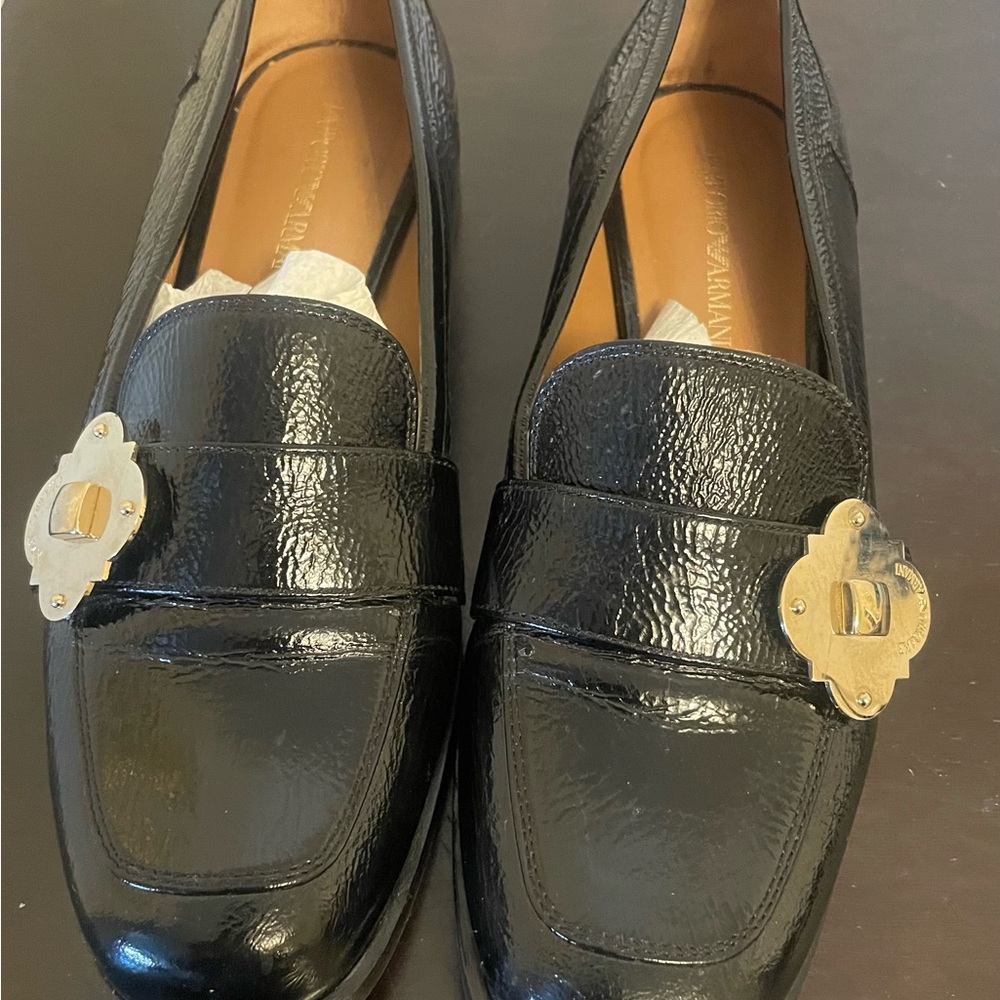 Brand new , Emporio Armani size 8 , box not included .